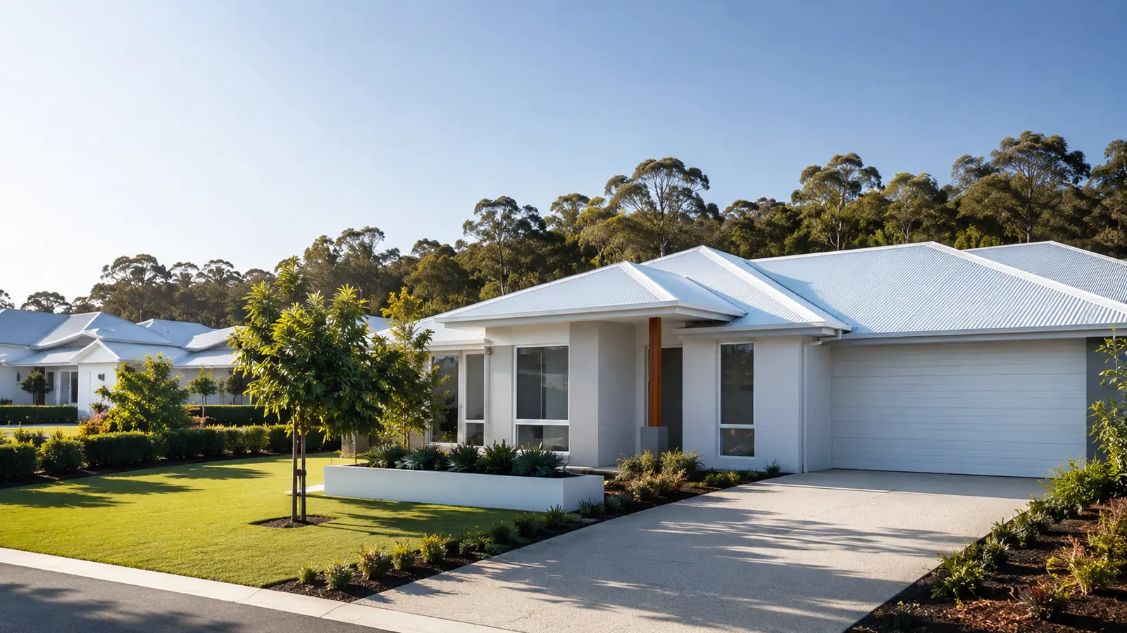 Single-storey residential home with a light-coloured roof, illustrating a NusCoolWall™ application scenario